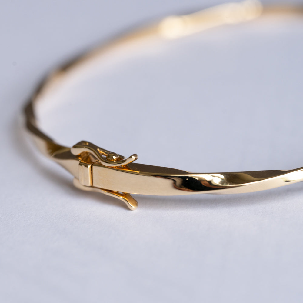 Twist Bangle with Pear Shape Diamond