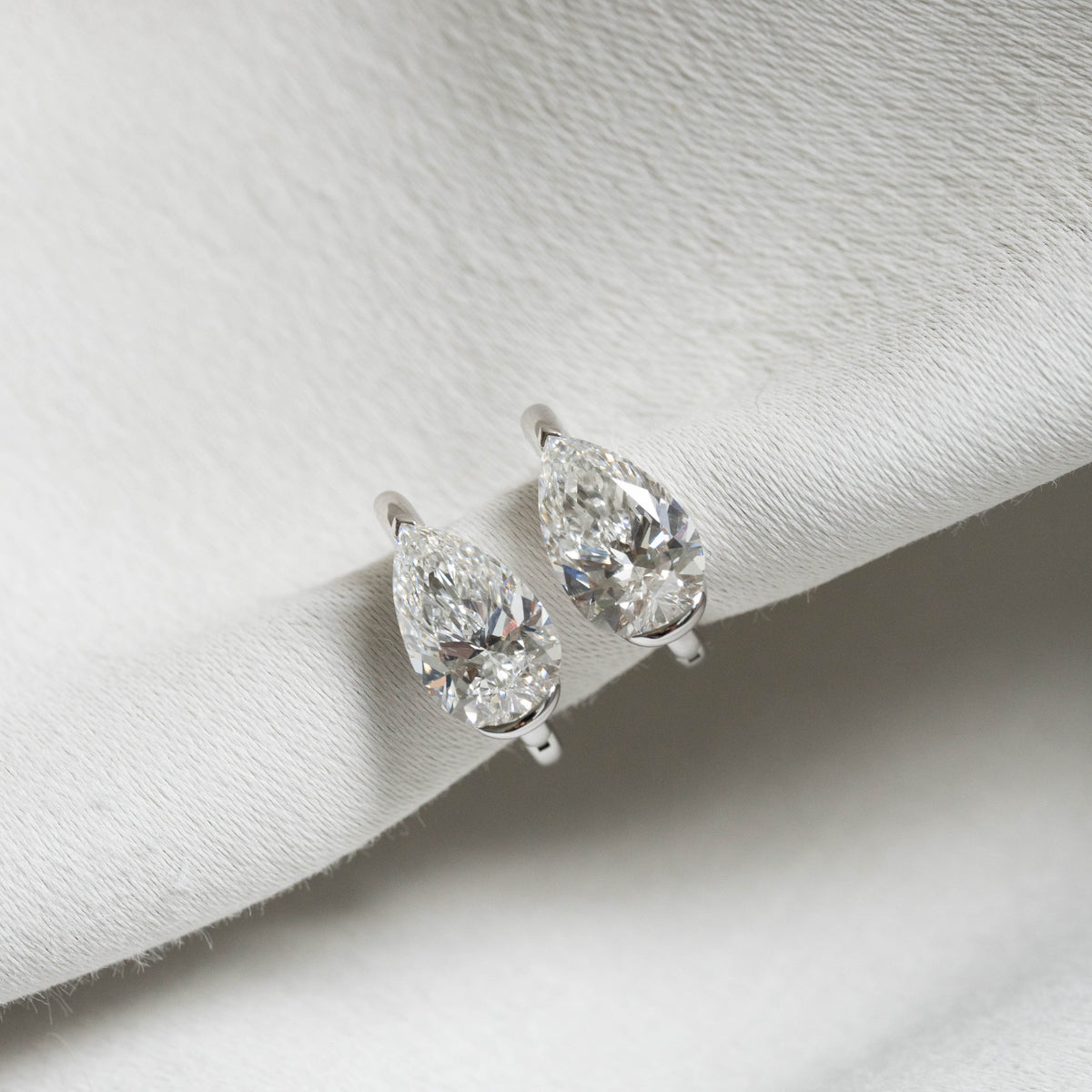 3ct Pear Solitaire Diamond Half Bezel Set Huggies